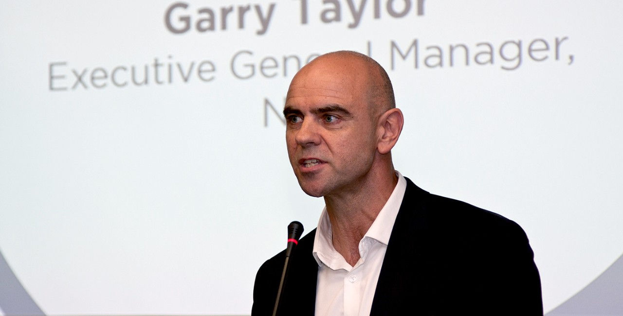 Gary Taylor speaking at an event